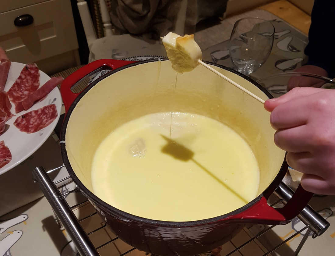 Dipping bread in the Fondue