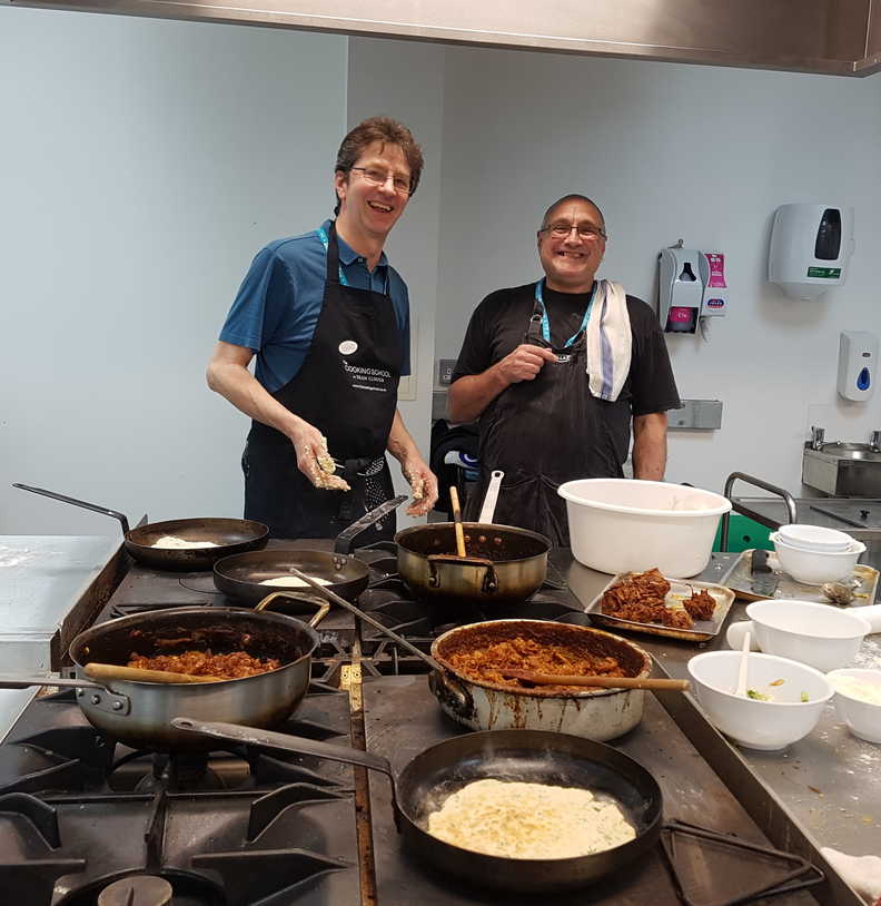 Mick and Karl. Cooking.