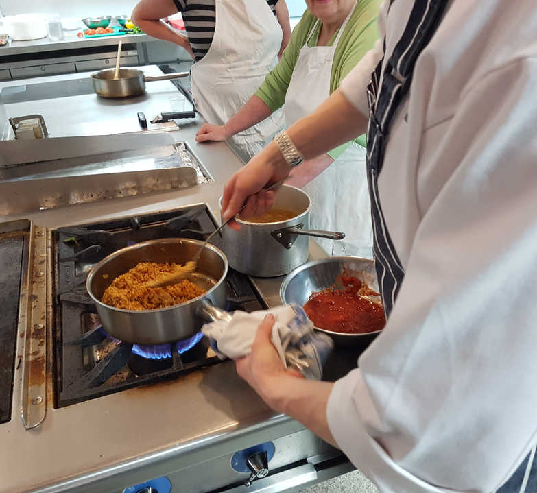 Aaron cooking paella