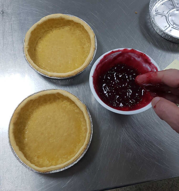 Blind-baked tarts with jam
