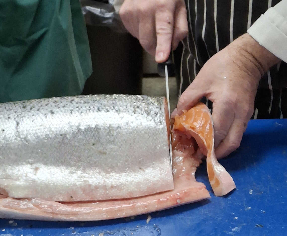 Cutting a Salmon Darne.