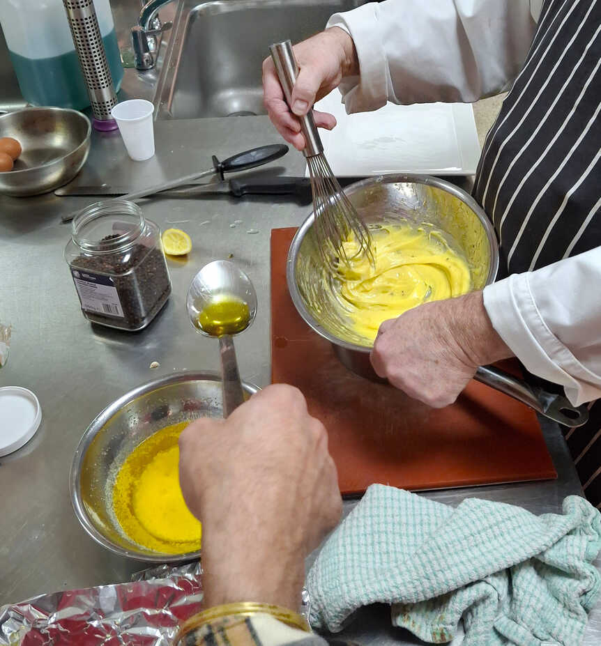 Buttering the eggs. One drop at a time.