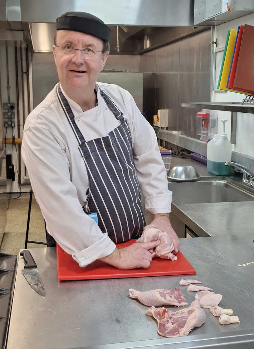 Teacher Paul identifies where the chicken keeps its wishbone