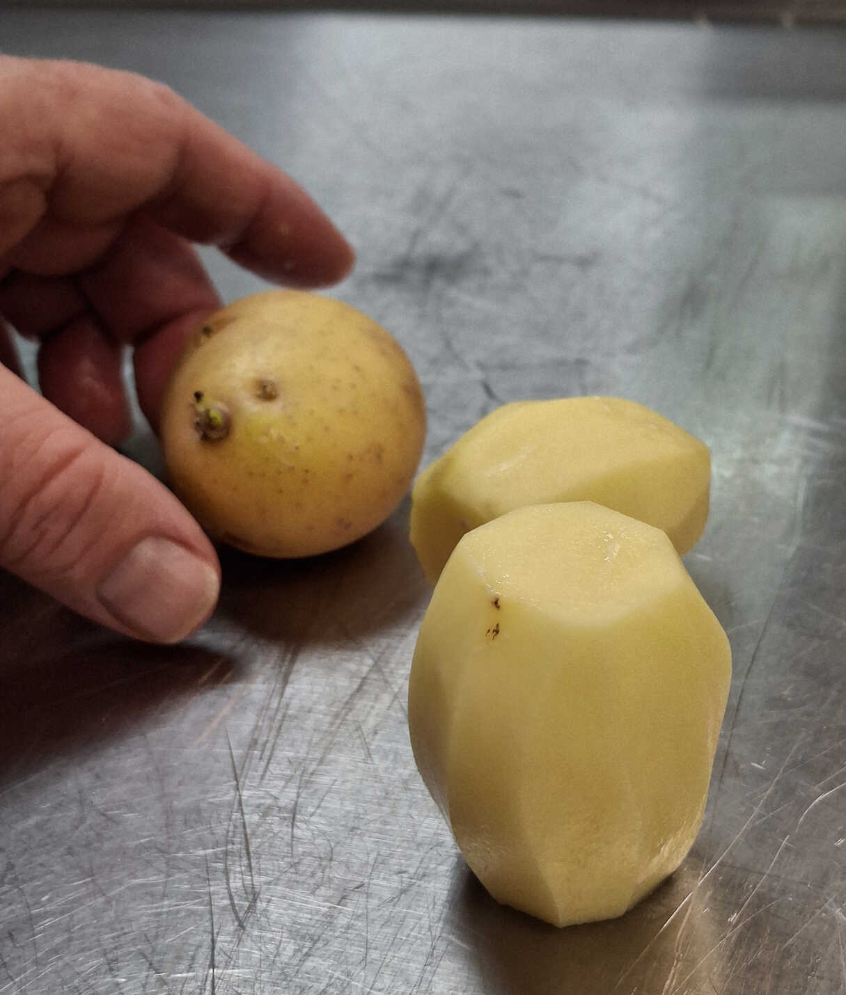 Paul Turning the Potatoes.