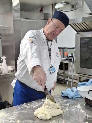 Teacher Paul Looking for the Fork Hatch.