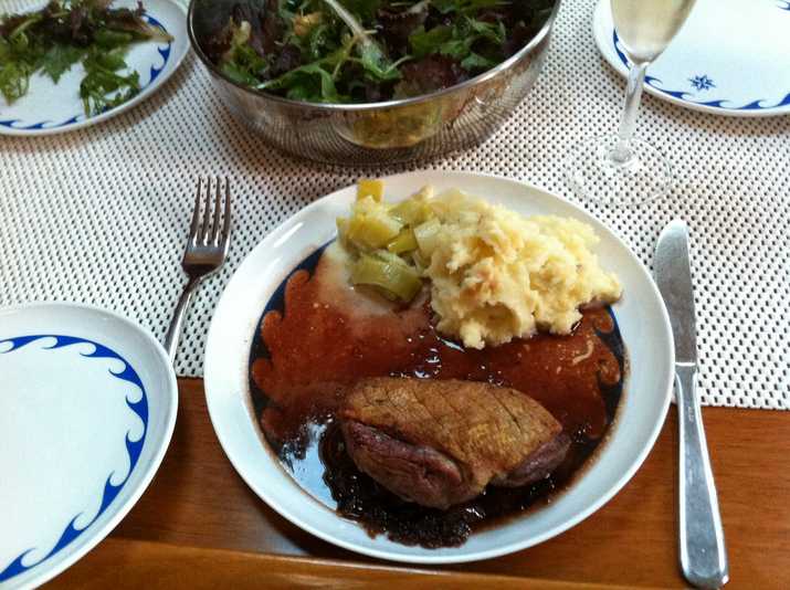 Duck breasts in cherry sauce with buttered leeks and lime thyme mash.