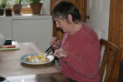 Mum tucking into perfect Eggs Hemingway