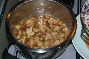 Cooking Cream of Cauliflower Soup with Black Truffle