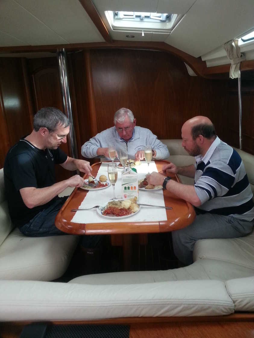 Skipper and crew eating a very nice steak lunch