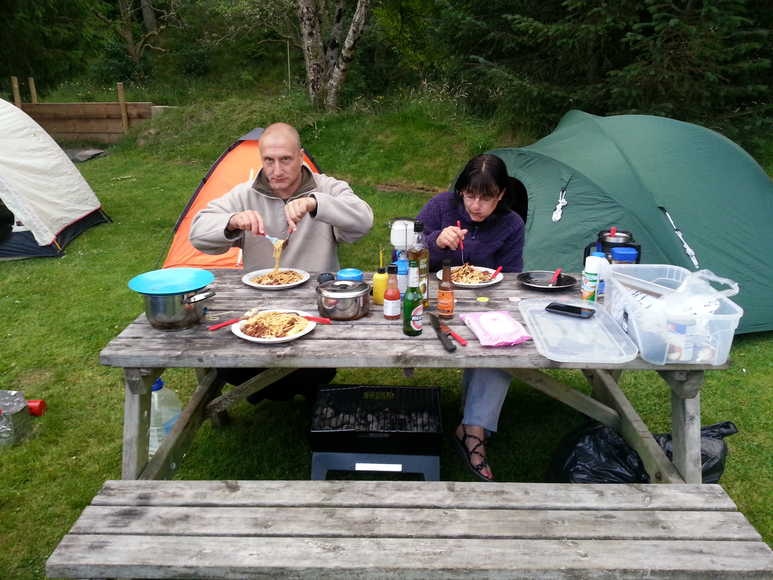 The American Gothic family delight in their spaghetti bolognese