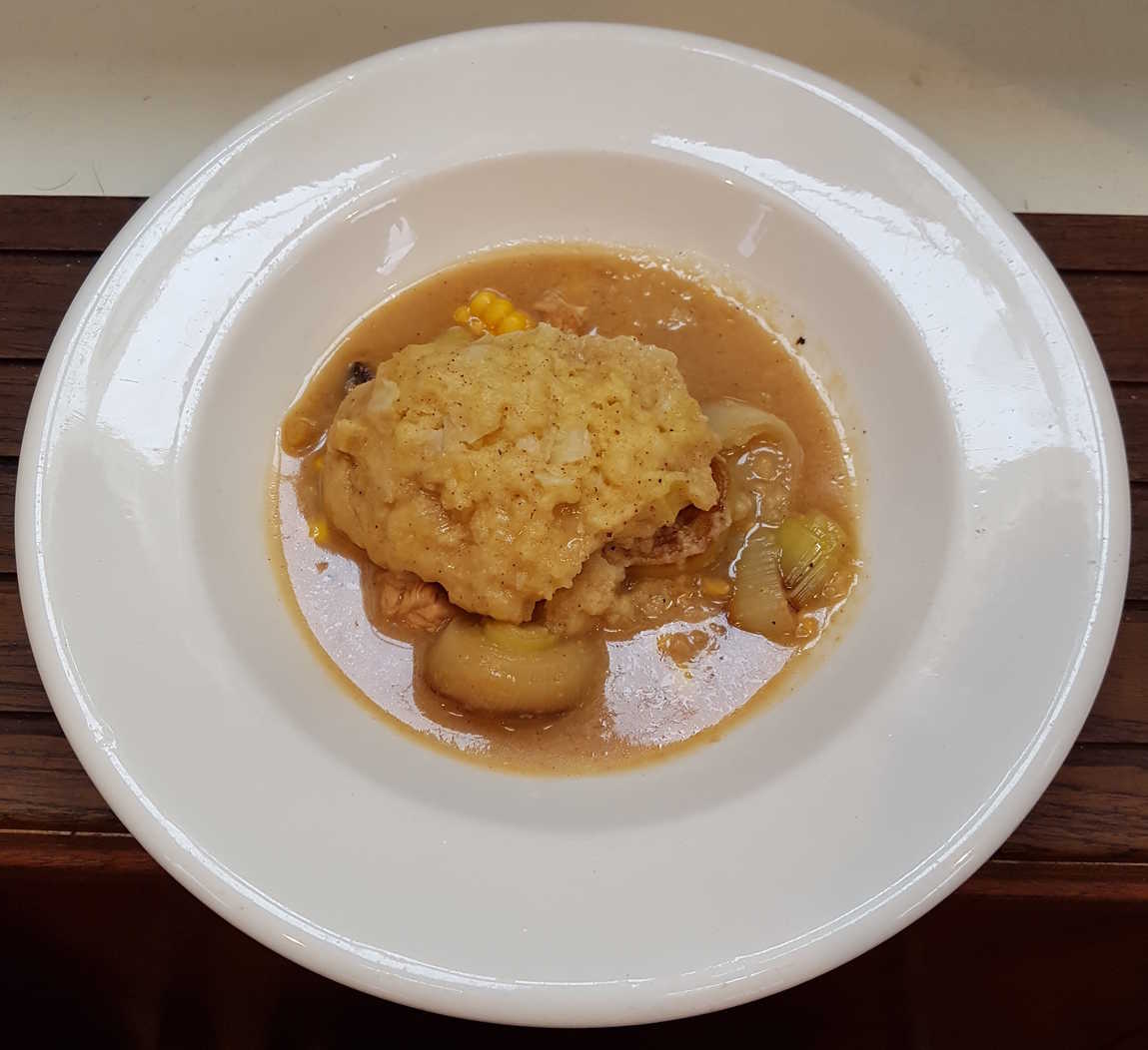 Chickpea flour dumplings in chicken, leek and sweetcorn soup