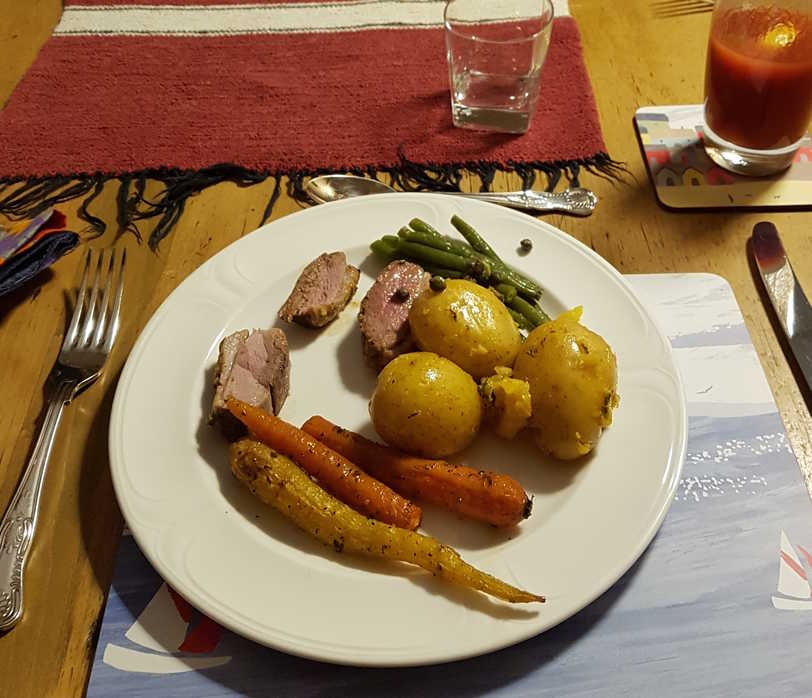 A plate of Honey, Orange & Thyme Glazed Duck Breasts