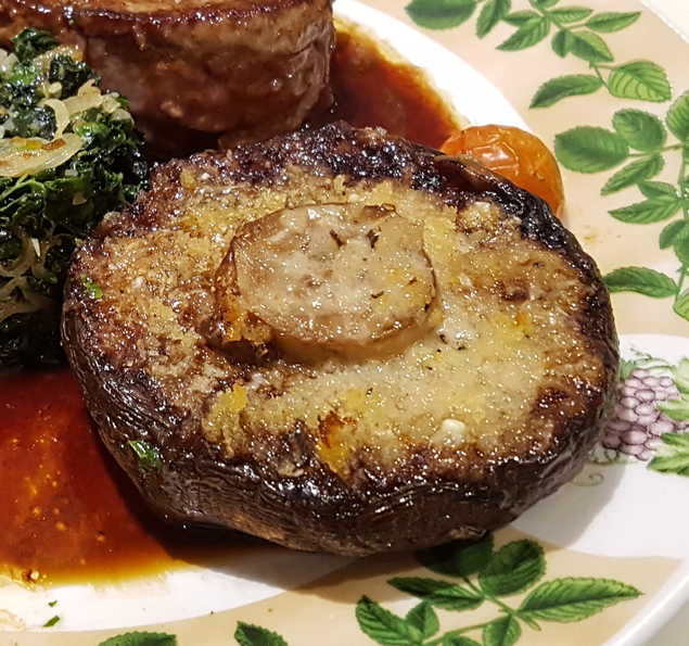 A Baked Mushroom. Stuffed with Garlic. Topped with Breadcrumbs.