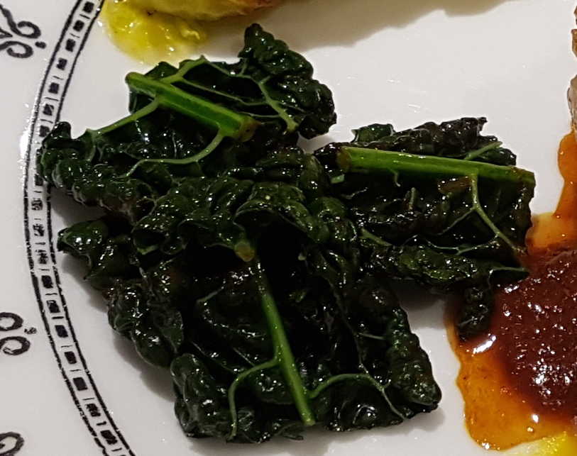 Cavalo Nero with Liquorice and Black Garlic Sauce.