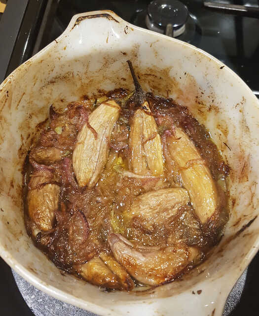 Roasting Graffiti Aubergines with Red Onions. And LOTS of olive oil.