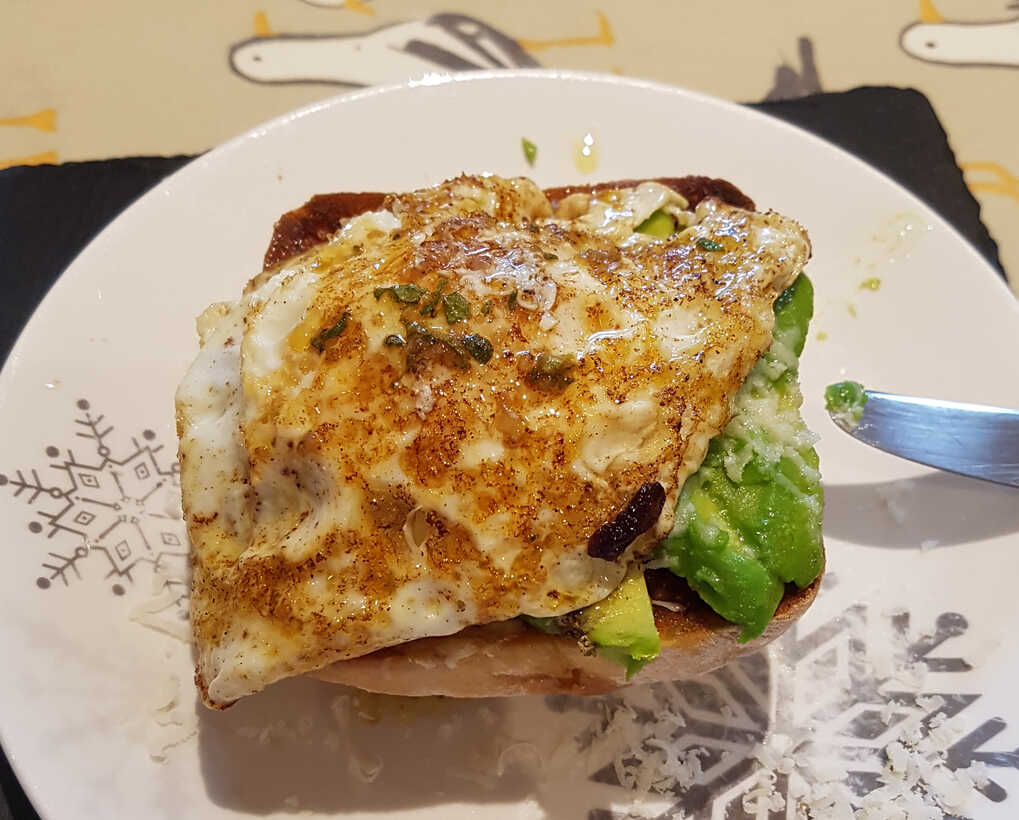 SUPER-GARLIC and Soy Sauce Dressing on Avocado Cheese with Fried Egg.