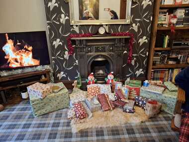 Presents in the fireplace.